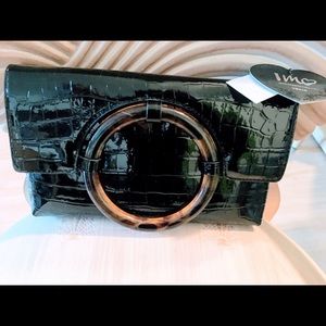 Ladies IMO black faux leather clutch bag.